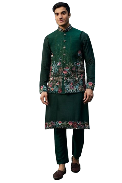 Man wearing traditional embroidered jacket with turban and green kurta outfit.